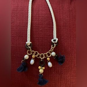White cord necklace with blue tassels & gold accents